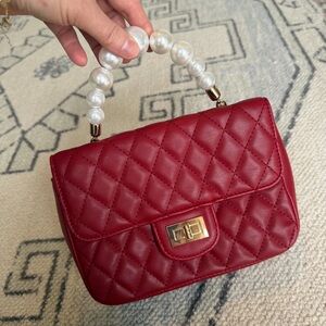 Red Quilted Handbag with Pearl Handle